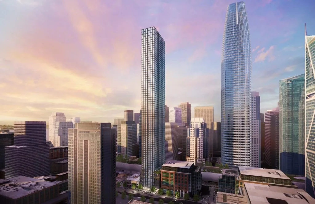 Skyline with tall modern skyscrapers at sunset.